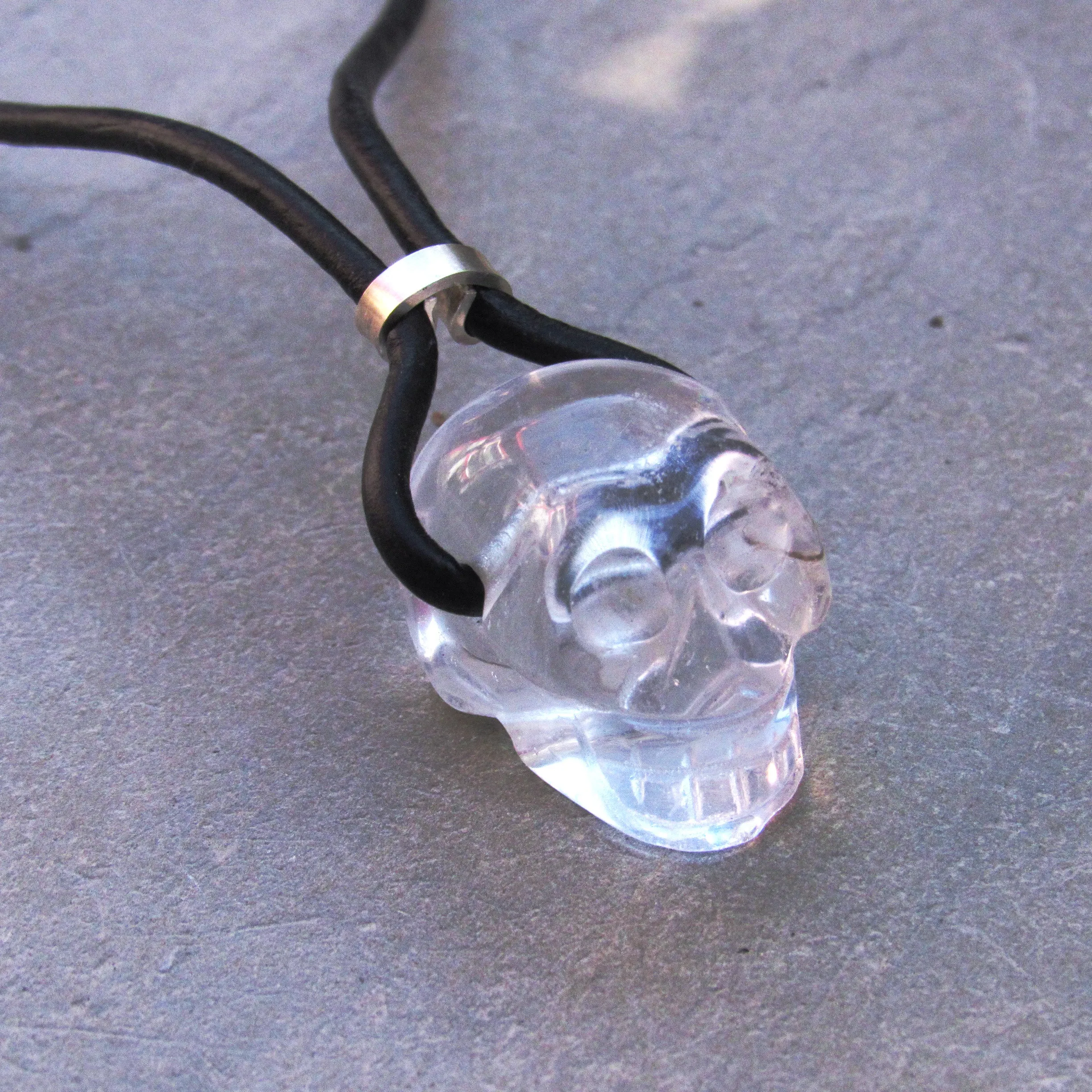 Genuine Gemstone Skull with Sterling Silver on genuine Leather Necklace